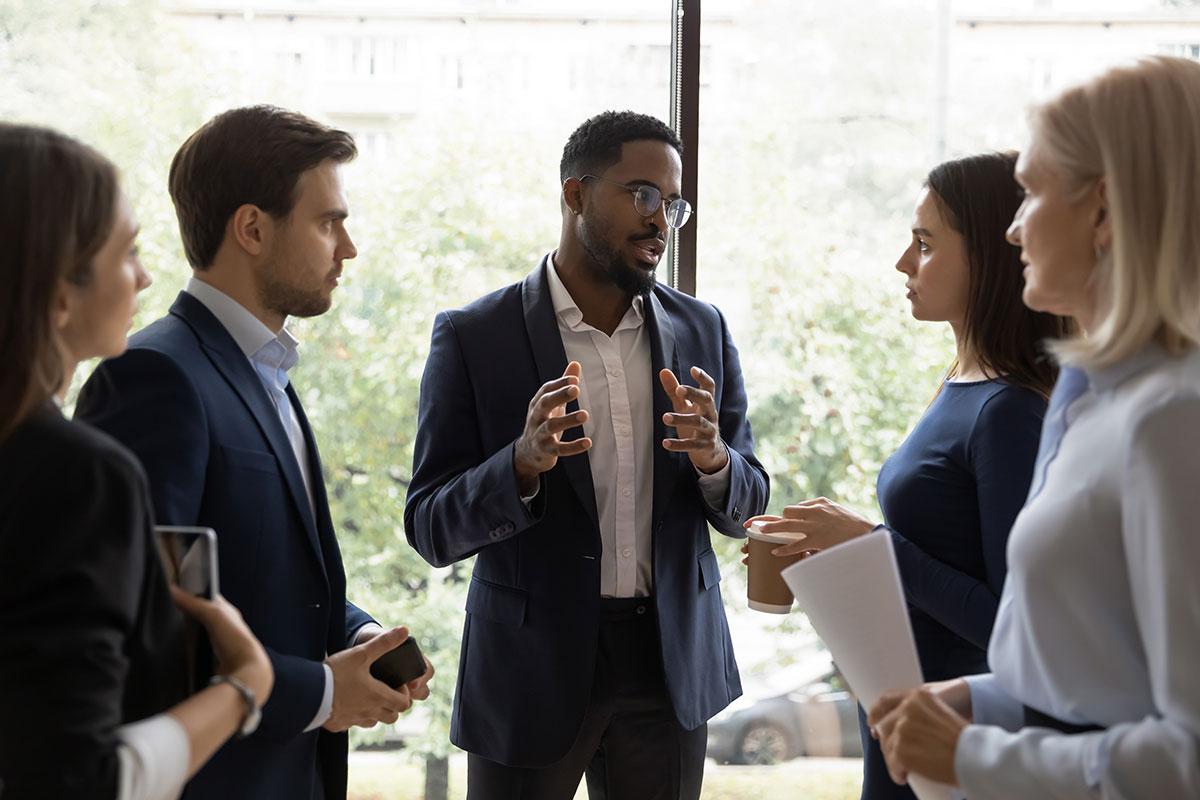 Group of professionals standing in a circle